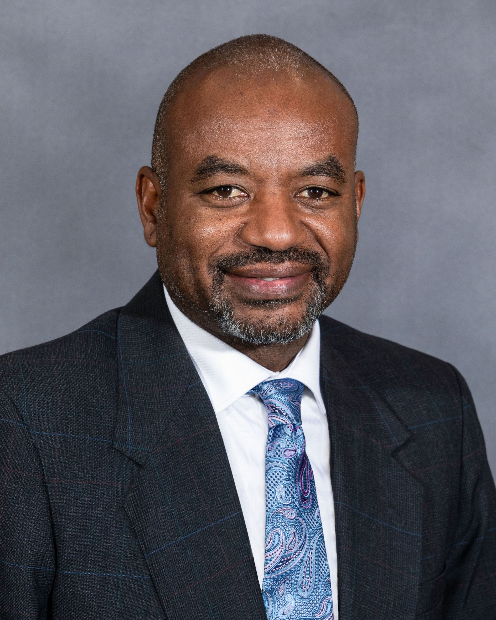 Professional headshot of Council Member Clarence Alsobrooks
